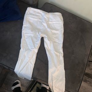 White ripped jeans